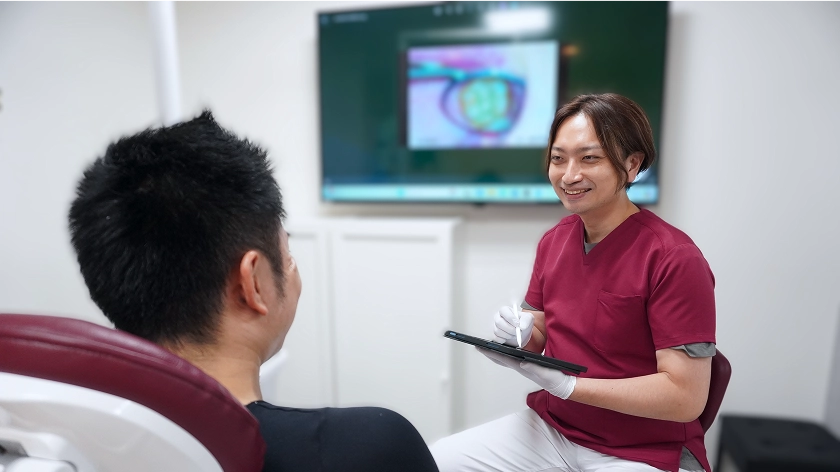 患者さんと医師の信頼関係を感じさせる場面。
